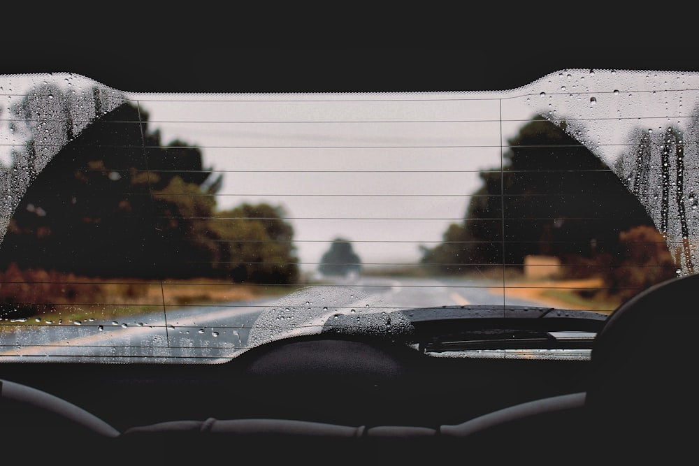 Car windshield with wiper blade