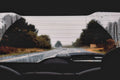 Car windshield with wiper blade