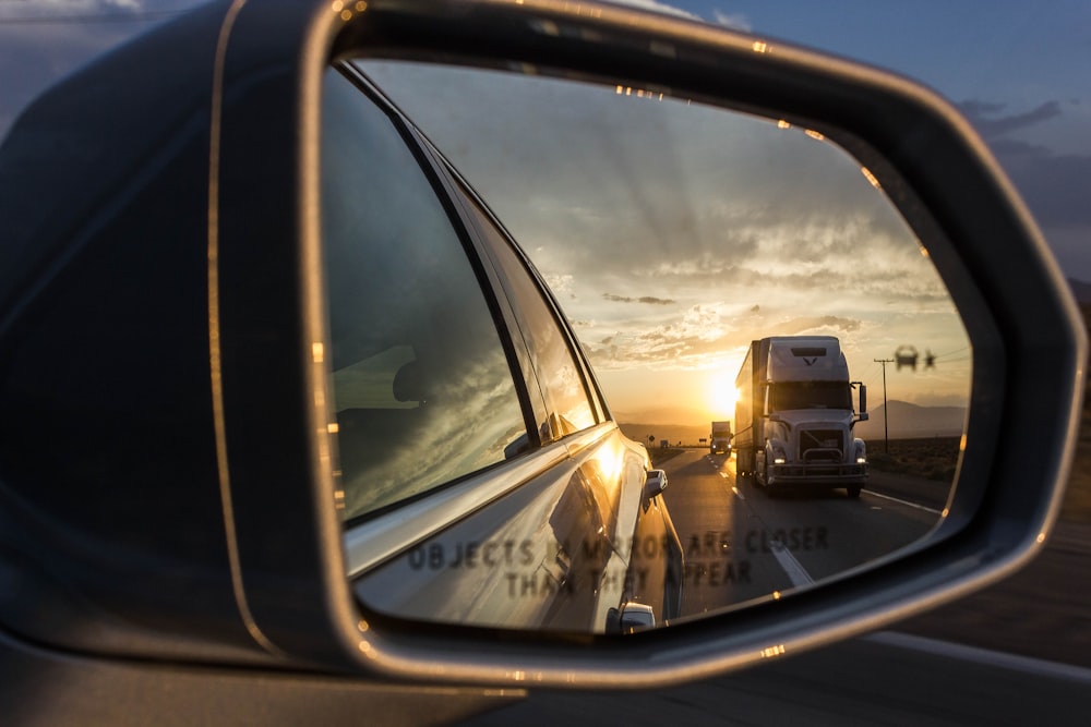 Towing mirror extension showing truck in reflection