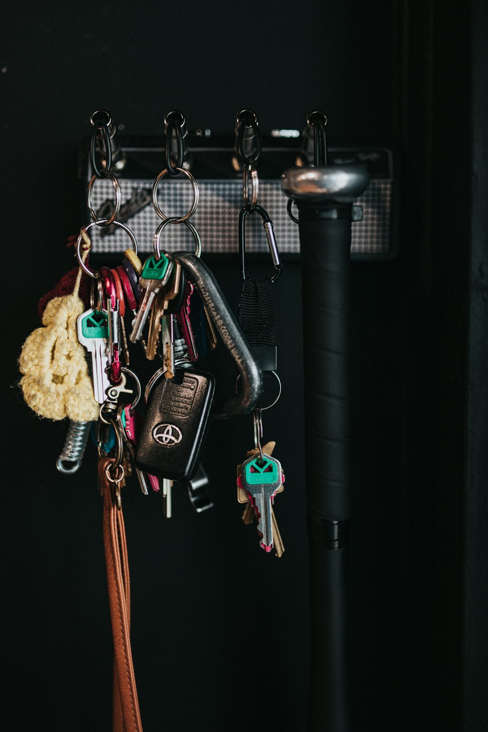 Black and silver car keys on surface