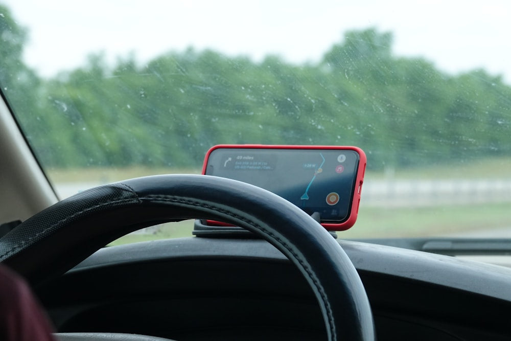 Car dashboard with cell phone mount