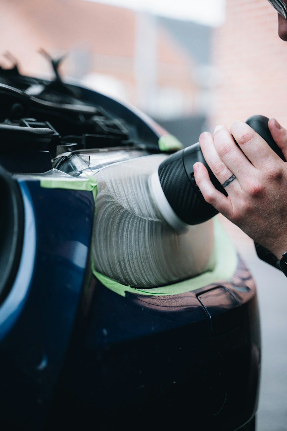 Person holding handheld vacuum