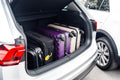 Car trunk with suitcase inside