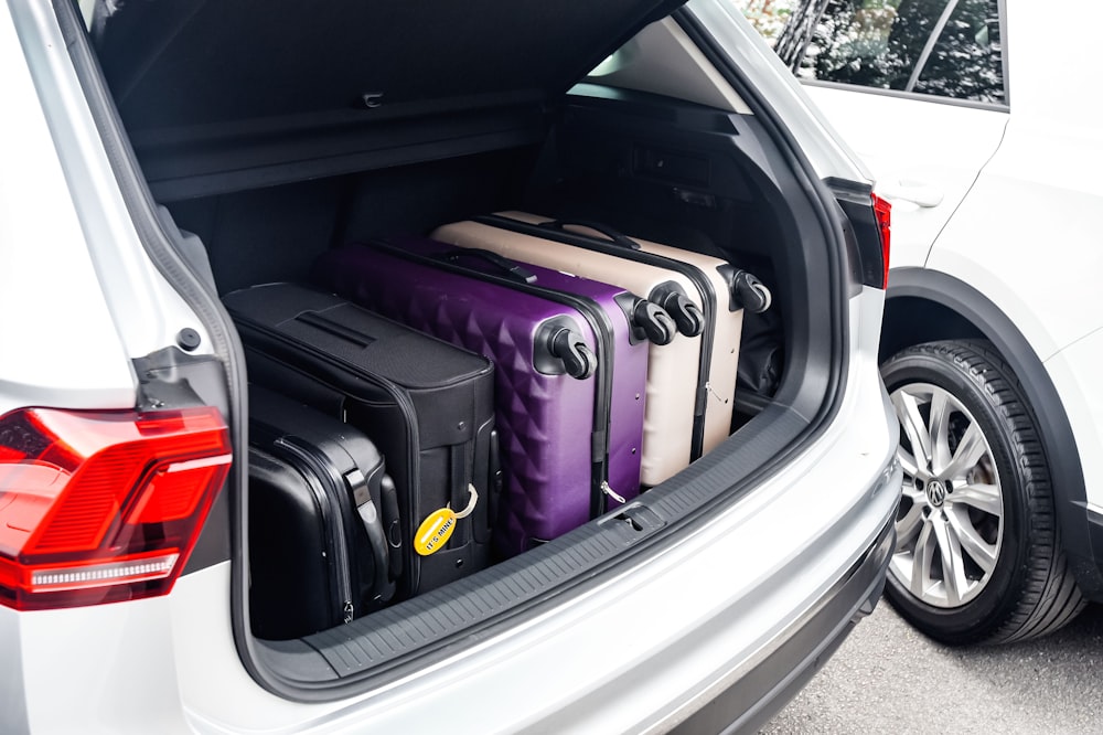 Car trunk with suitcase inside