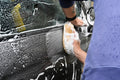 Person cleaning car interior