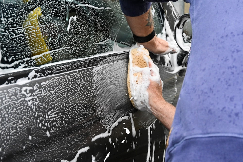 Car exterior being cleaned