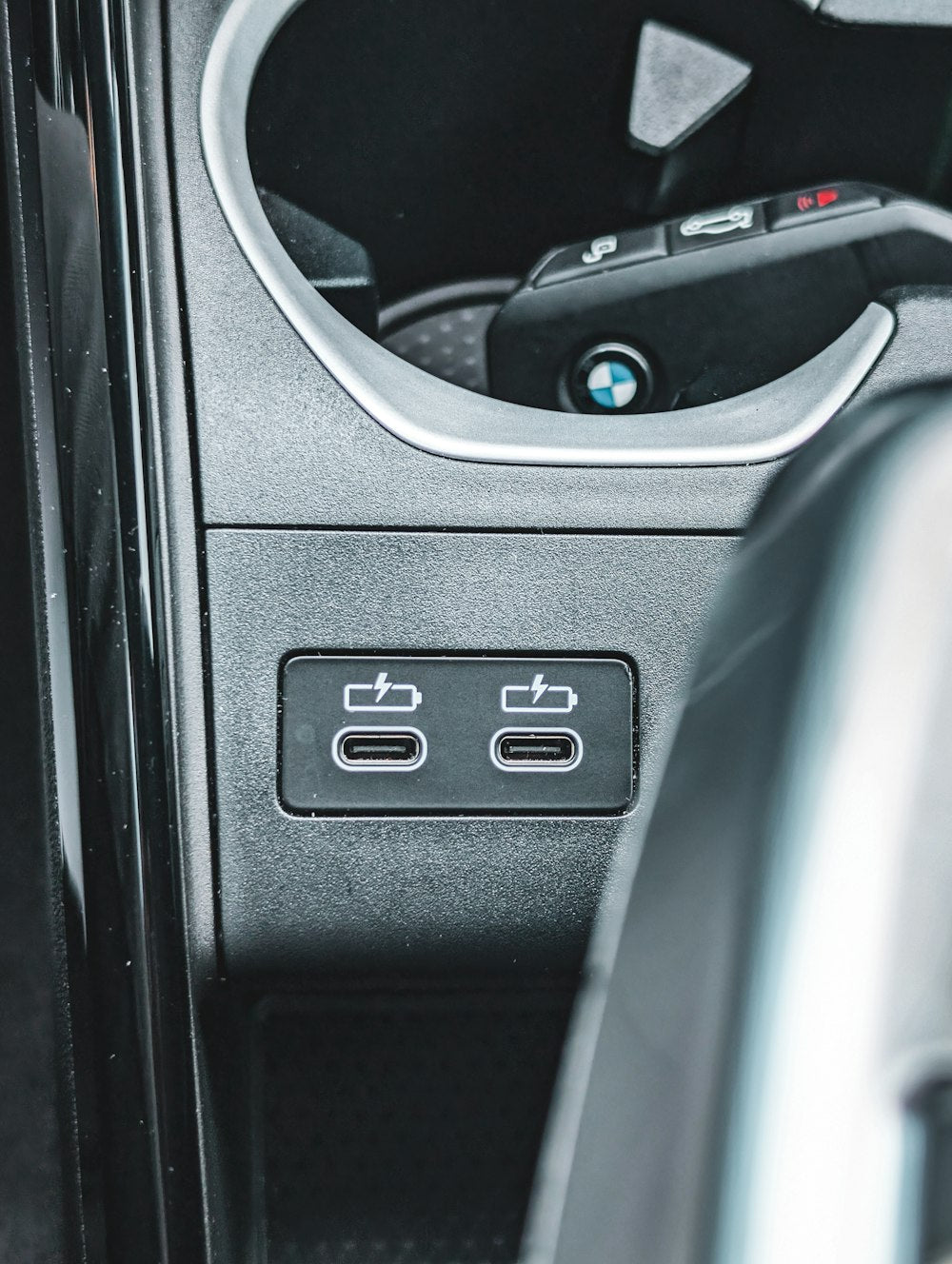 Car USB-C charging ports and cupholder