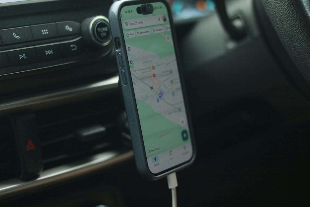 Smartphone with navigation app mounted in car vent